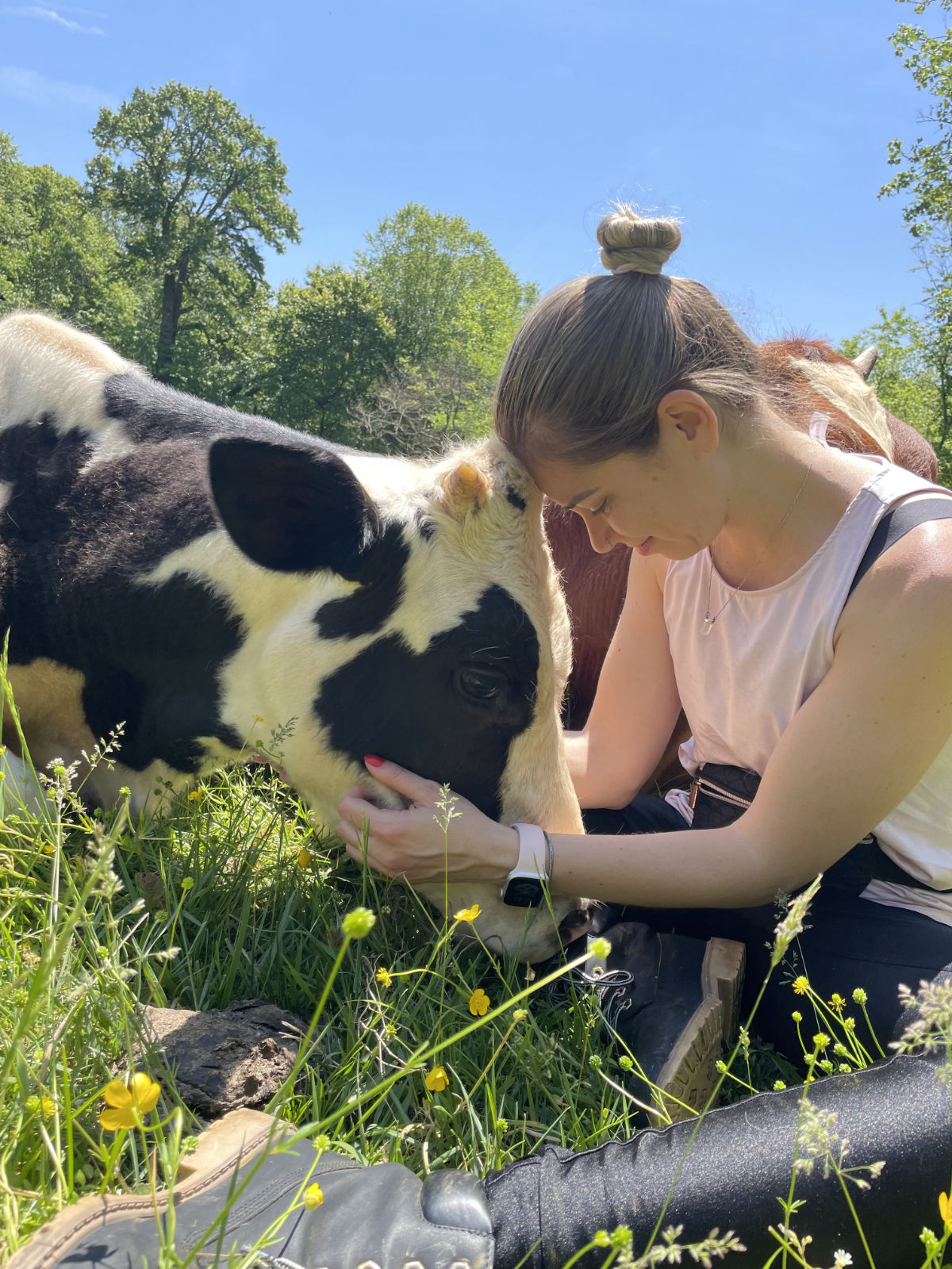 Volunteer with mickey cow